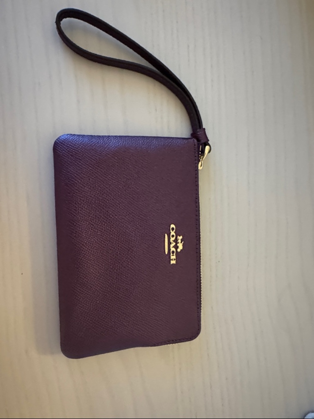 Coach Plum Leather Wristlet with Gold Logo
